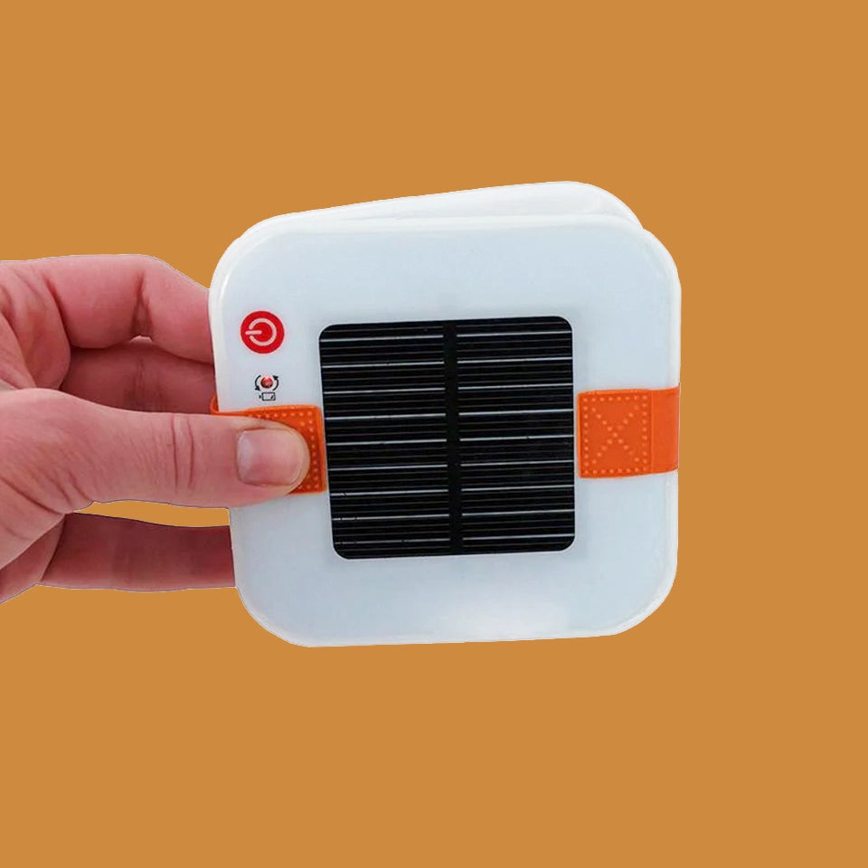 Compact, foldable, ultra-lightweight, and waterproof solar flashlight.