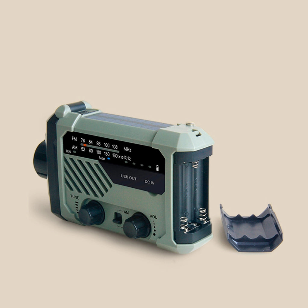 Solar-powered emergency radio with hand crank.