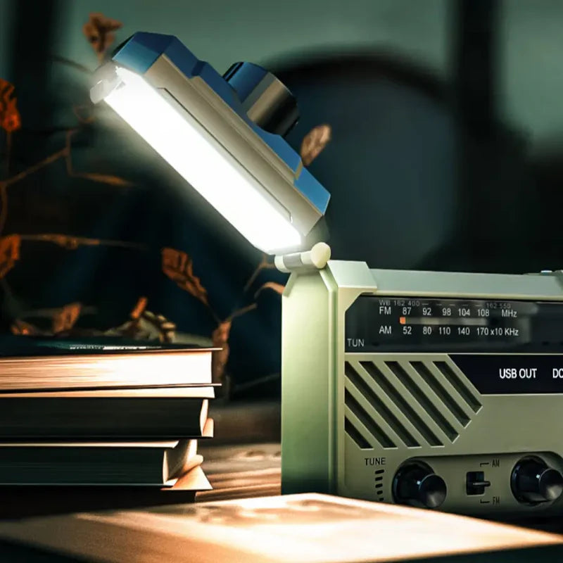 Solar-powered emergency radio with hand crank.